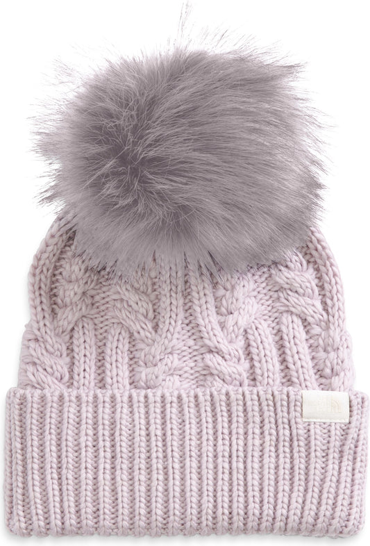 Knitted beanie hat with faux fur pompom.