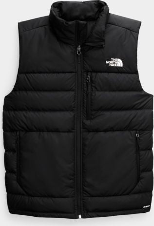 A black puffer vest with a full front zipper, pockets, and a high collar. The logo 'THE NORTH FACE' is visible on the upper right chest.