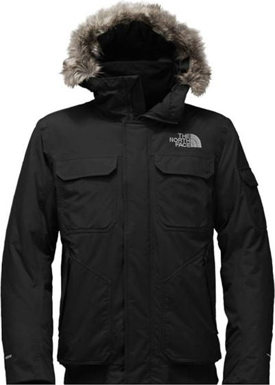 Black parka jacket with fur hood and chest pockets.