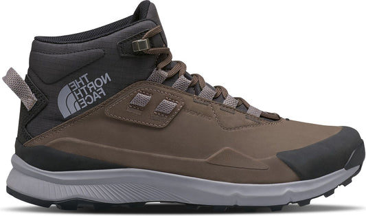 A brown and gray mid-top hiking shoe with dark gray accents, a gray sole, and "THE NORTH FACE" printed in gray and white on the heel.