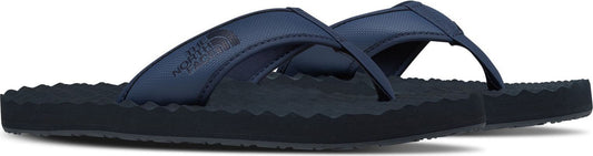 Navy blue flip-flops with textured soles.