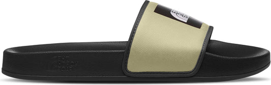 A slide sandal with a tan strap and black sole.
