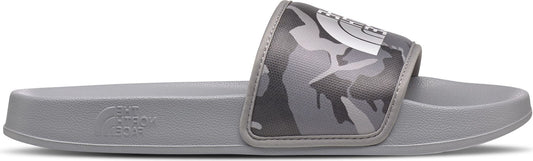 A gray slide sandal with camouflage upper.