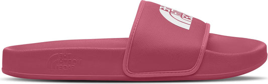 A rose-colored slide sandal with a white logo.