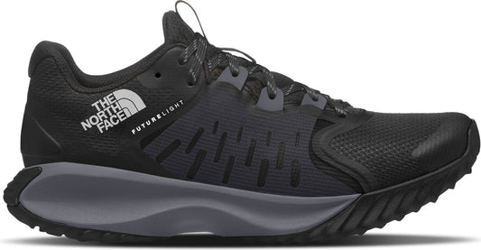 Black trail running shoe with grey accents and a lugged outsole. "THE NORTH FACE" text is visible on the side.