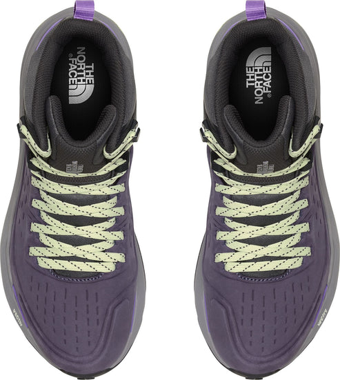 Pair of hiking boots, top view, dark purple upper with green laces, The North Face logo on insole.