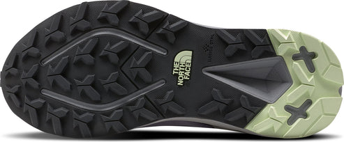 A shoe sole featuring geometric patterns and the North Face logo.