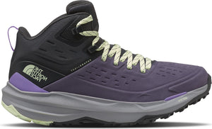 High-top hiking shoe, purple toe box and body, black ankle and heel, gray treaded sole, "THE NORTH FACE" logo on heel.