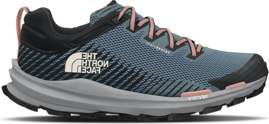 A blue and black athletic shoe with pink laces.