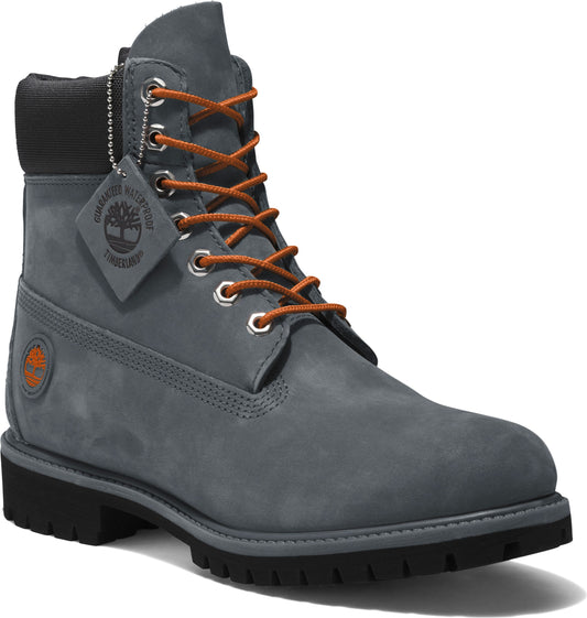 Gray suede boot with brown laces, black heel, and a waterproof tag.