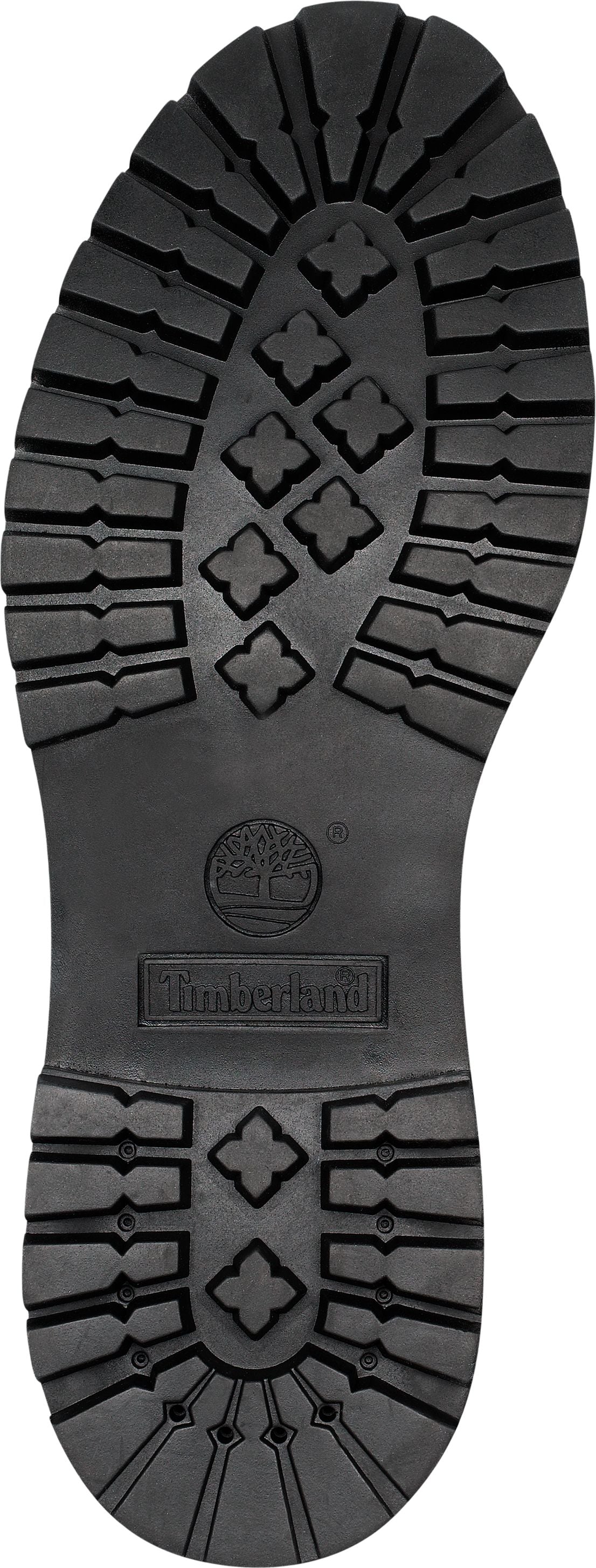 Sole of a black boot with a patterned tread, including the Timberland logo.
