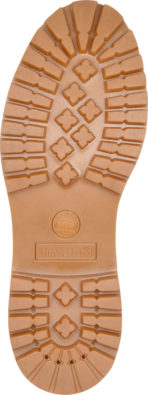 The tan-colored outsole of a shoe features a pattern of rectangular and four-pointed star-shaped treads, along with visible branding.