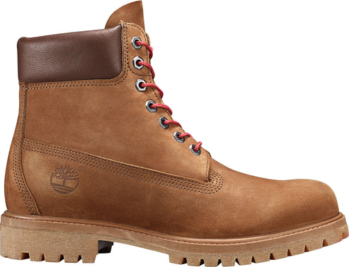 Brown nubuck leather boot with red laces, brown leather collar and lugged sole.