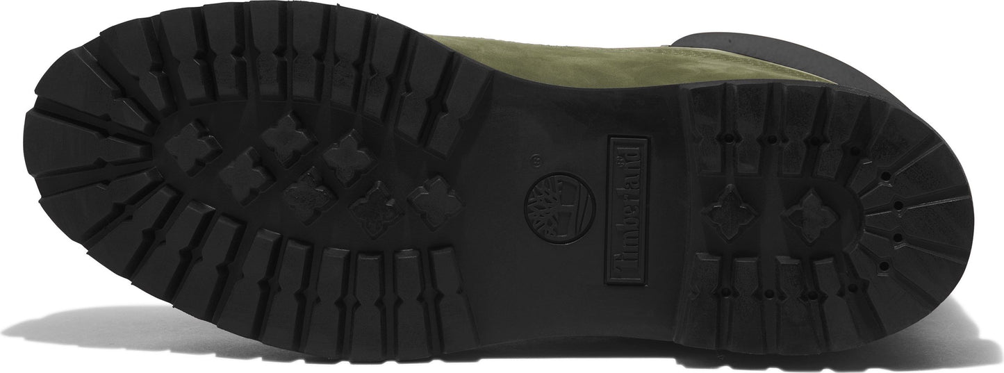 The bottom of a lug-soled work boot is black, with a visible logo.