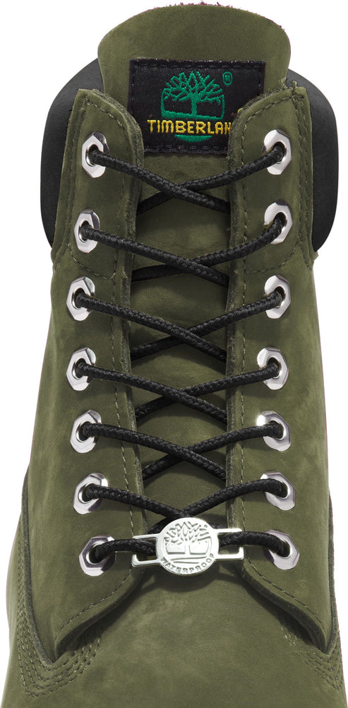 Olive boot with black laces and silver eyelets and Timberland logo.