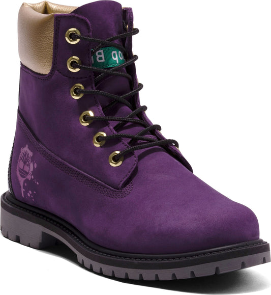 Purple 6-inch boot with gold trim, black laces, and green label on the tongue.