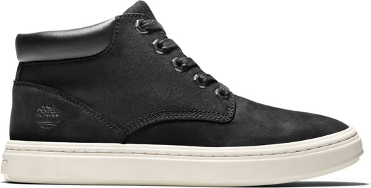 Black ankle-high nubuck sneaker with a leather collar and a white sole.