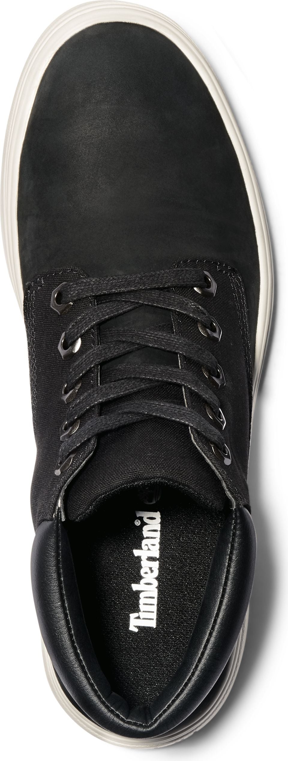 A black Timberland shoe with white laces and a white sole.