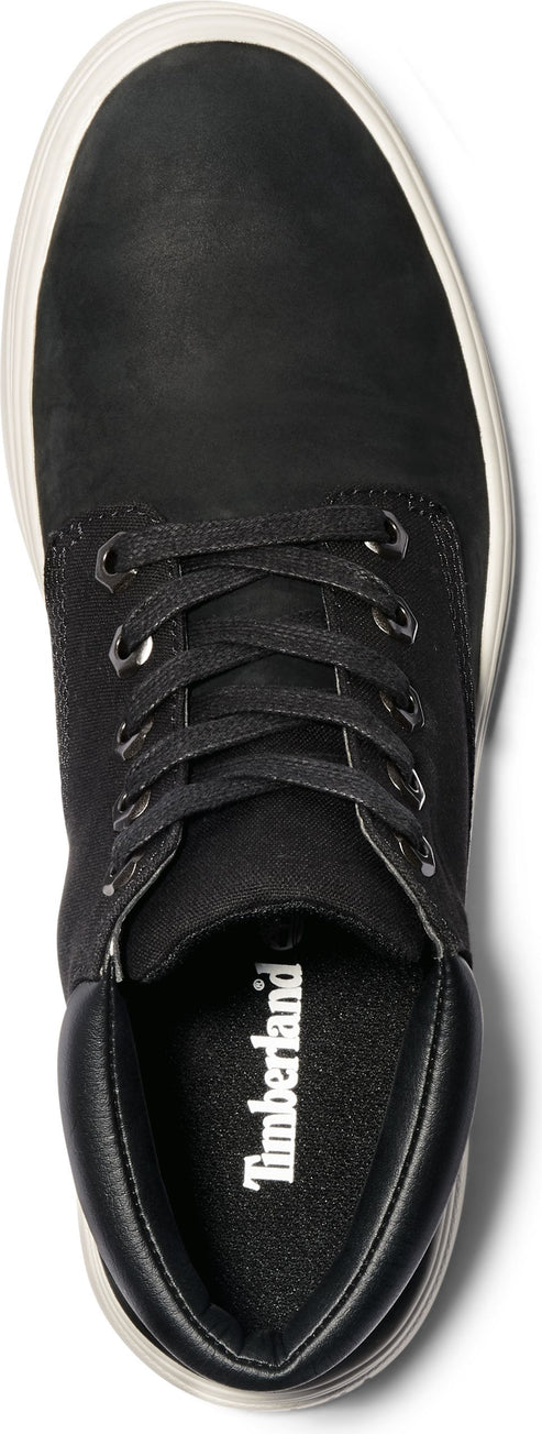 A black Timberland shoe with white laces and a white sole.