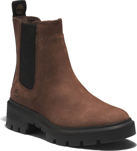Brown suede ankle boot with black elastic side panel and black lug sole.