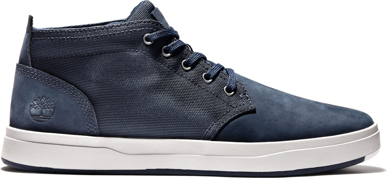 A blue shoe with a white sole and laces.