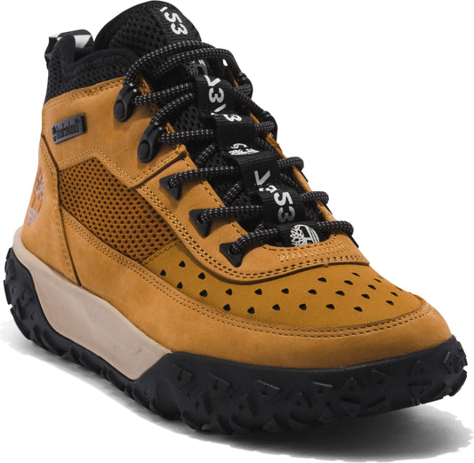 A brown leather hiking boot with black laces and a black rubber sole. The boot has a high top and a lace-up closure. There are rows of air holes on the front and sides of the shoe and '353' written on the laces.