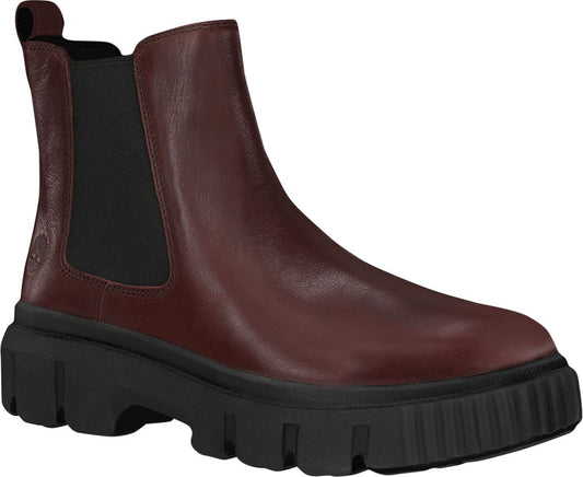 A maroon, leather, lug-soled Chelsea boot.