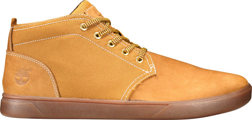 A tan casual sneaker with tan laces and a brown sole.