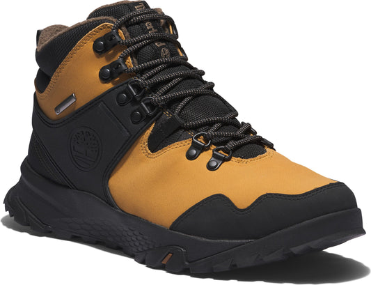 Mid-height boot in tan and black with laces and rubber sole.