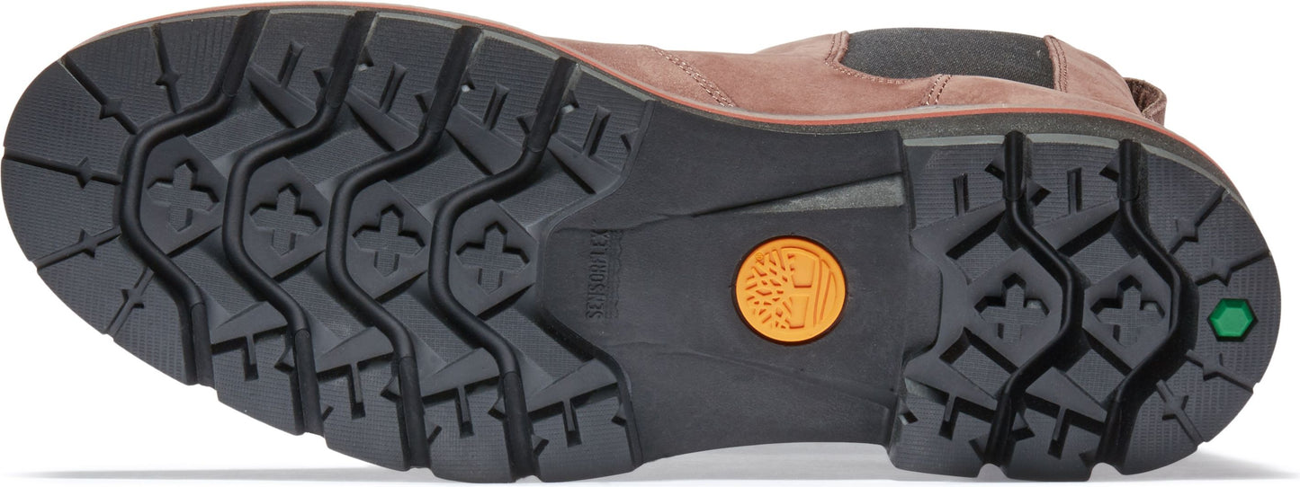 A boot outsole features a black tread pattern with shapes resembling clovers and small rectangles.