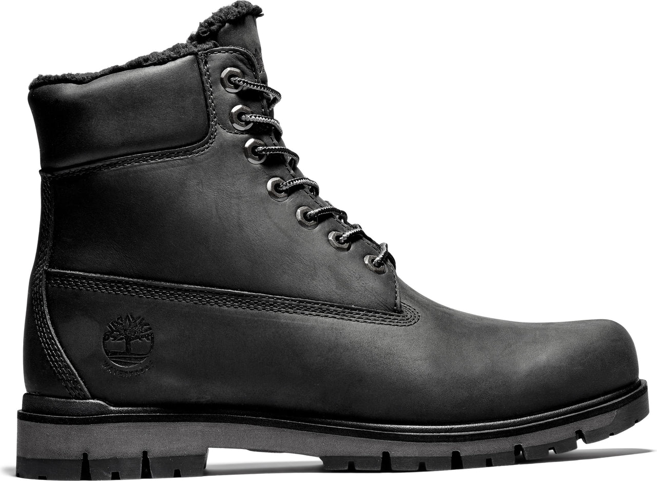 Black leather work boot with a dark grey sole and dark grey laces. The top of the boot is lined with dark colored fur.