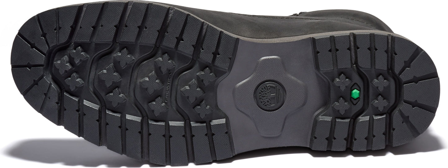 The sole of a shoe with a black textured pattern and a circular logo.