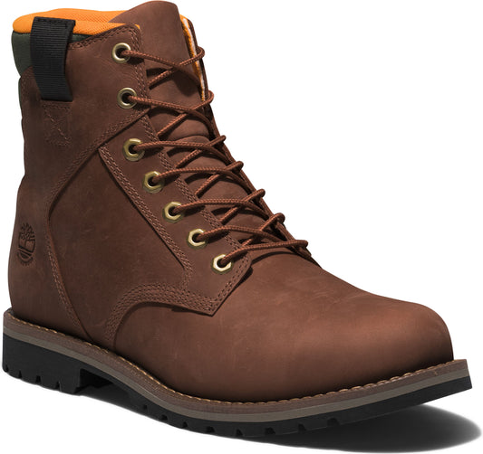 Brown leather work boot with metal eyelets and orange interior.