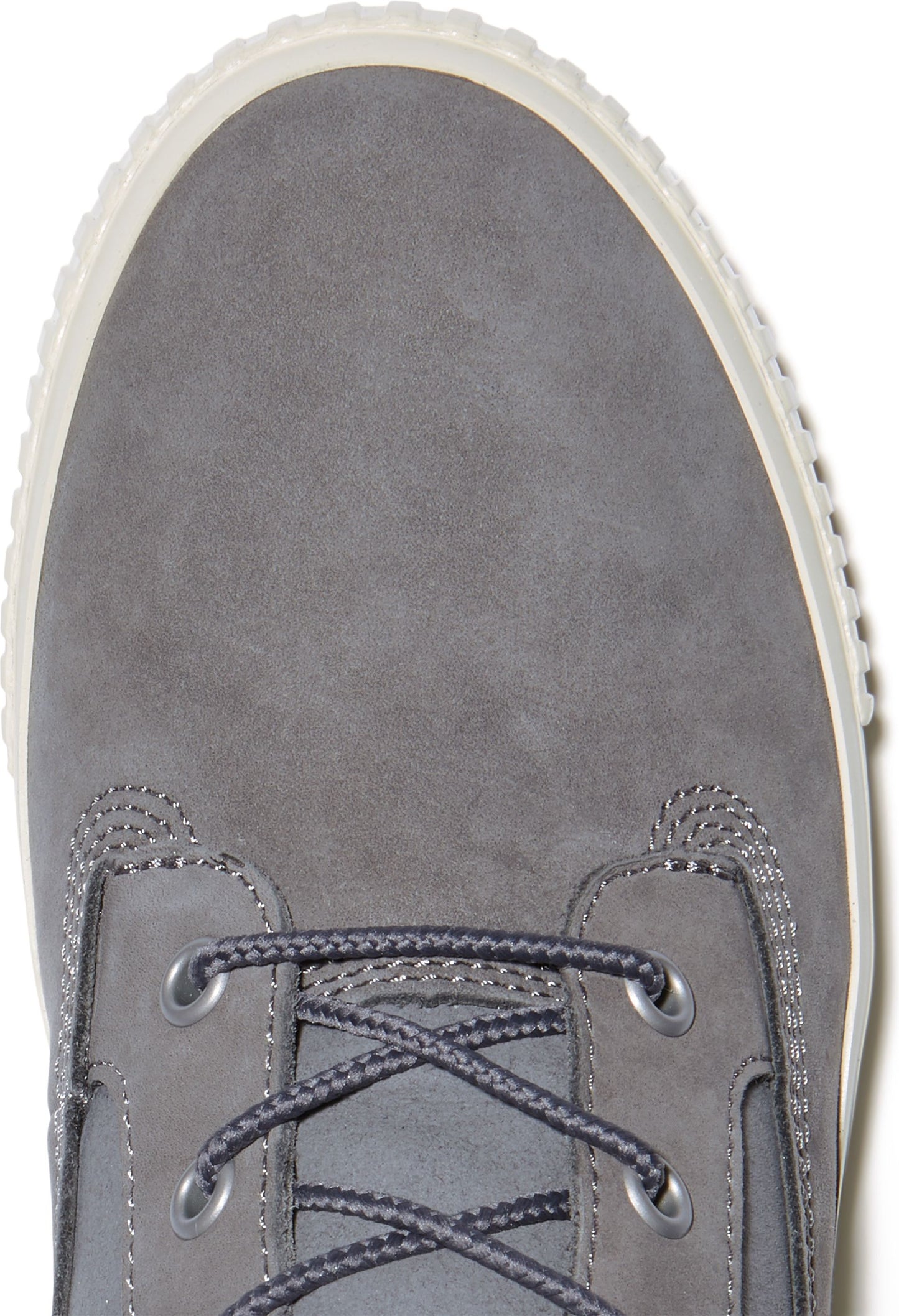 Close-up of a grey suede boot featuring a lace-up closure with dark grey laces.