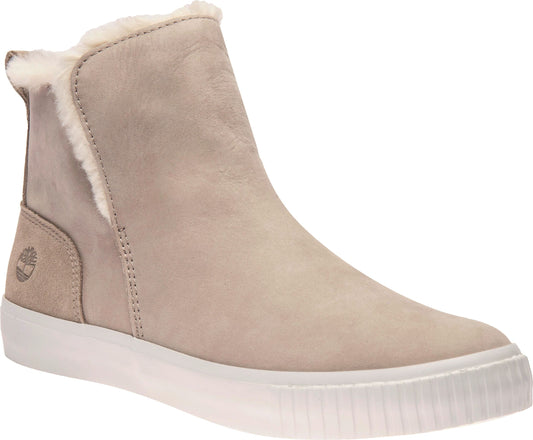 Beige ankle boot with white sole and faux fur lining.