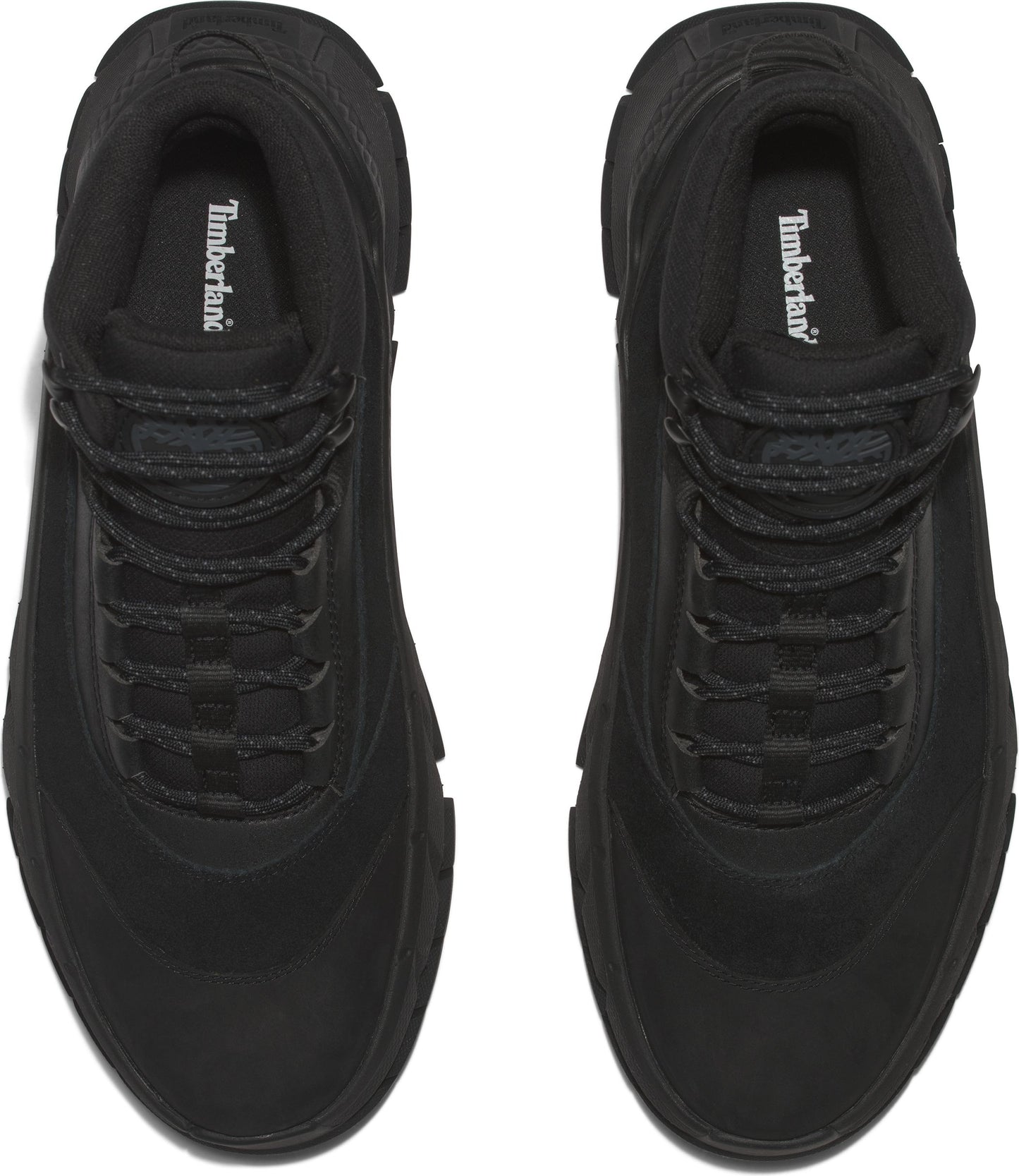Overhead view of two all-black, lace-up Timberland boots.