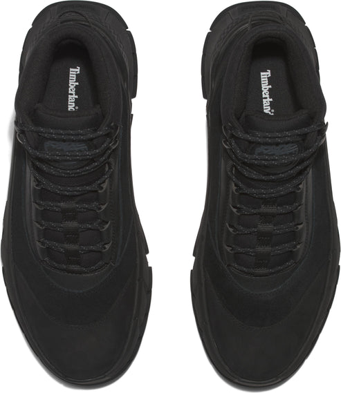 Overhead view of two all-black, lace-up Timberland boots.