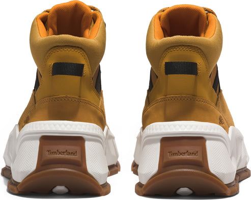 Back view of tan high-top boots with thick white and brown soles.