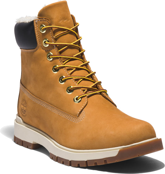Tan leather boot with yellow laces, gold eyelets, faux fur trim, black heel cushion, and a white sole.