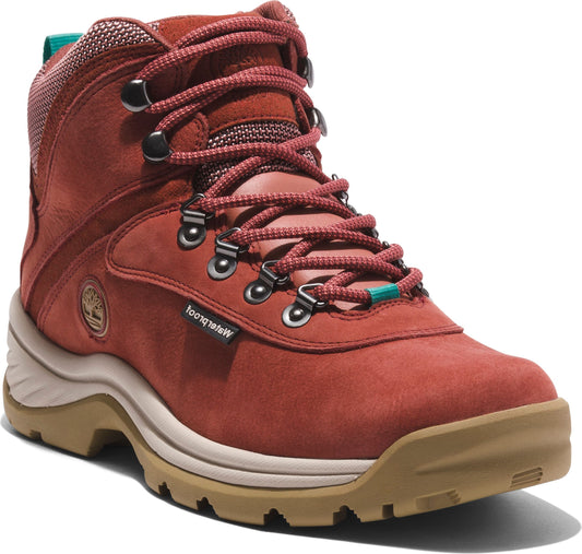 Red leather hiking boot with metal eyelets, patterned laces, and chunky sole labeled 'waterproof'.