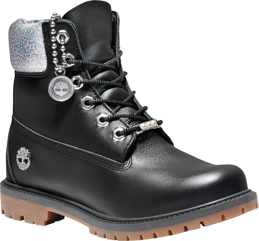 Black leather boot with silver accents, lace-up closure, and lug sole.