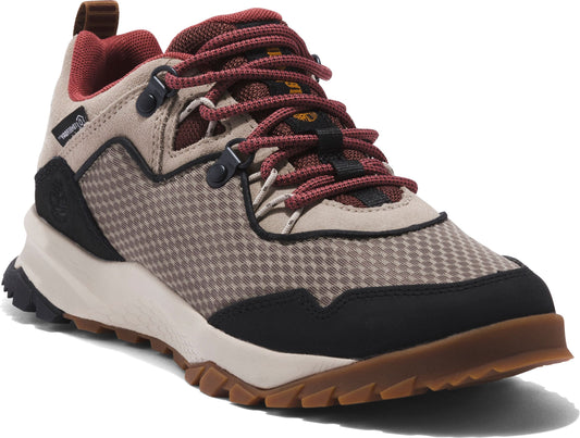 Hiking shoe with a tan and brown checkered pattern on the front and sides, a red lining, and brown shoelaces.