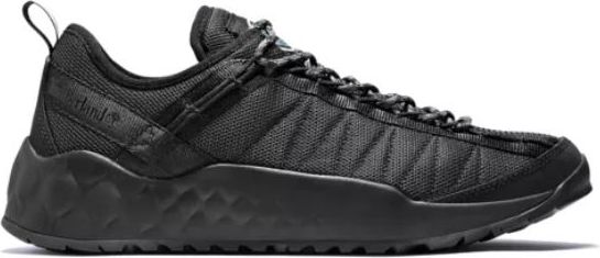 A black sneaker featuring a textured sole and fabric upper.