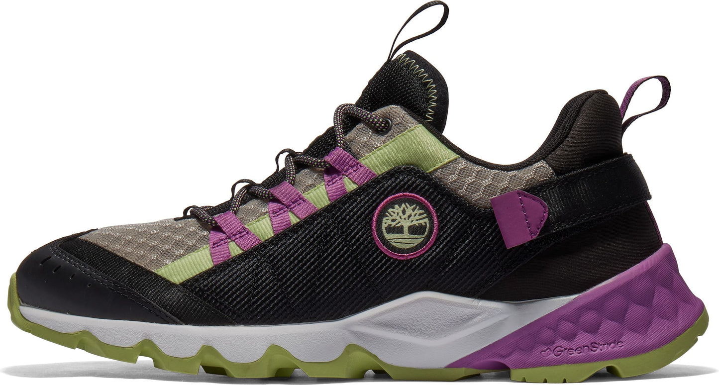 Sideways view of a black hiking shoe with light green and purple accents, featuring a hexagonal patterned upper, thick patterned sole and Timberland logo.