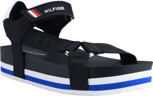 Platform sandal with velcro straps, white heel and blue/white stripes on the sole.