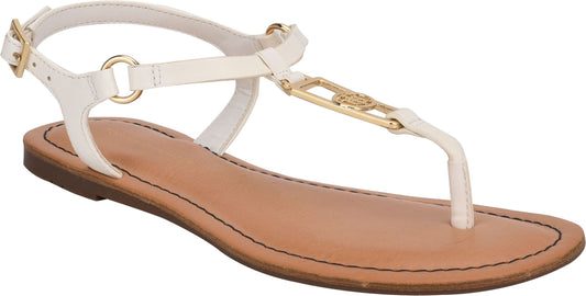White leather t-strap sandal with adjustable ankle strap and decorative gold-colored hardware.