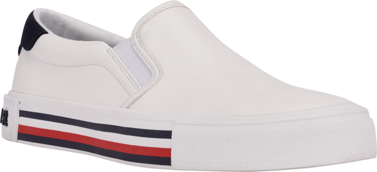 A white slip-on shoe with red, white, and blue stripes on the sole.