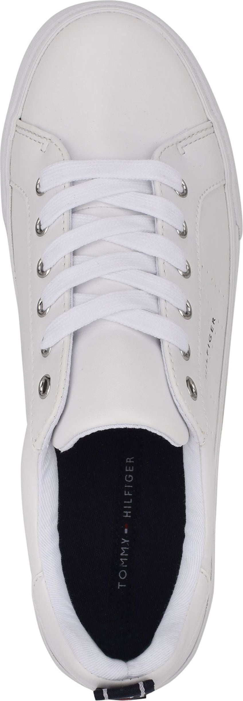 a white sneaker with white laces and silver eyelets