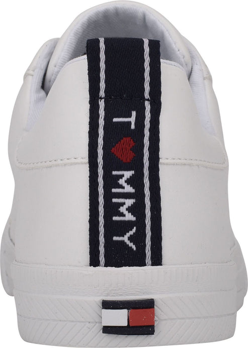 White sneaker with a navy blue stripe down the back that reads "I (heart) MMY" and a small flag logo at the bottom.