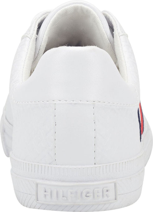 Back view of a white sneaker with 'HILFIGER' inscribed on the sole.